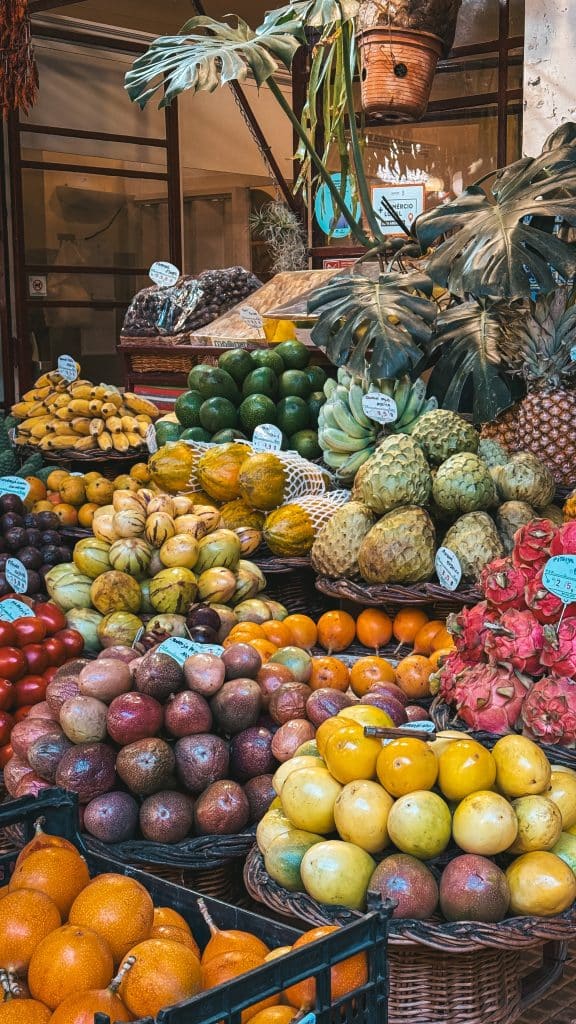 An exotic fruit stall at the Mercado dos Lavradores