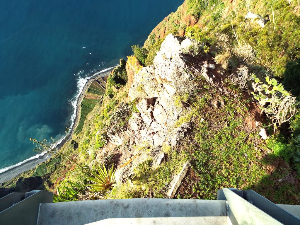 The Cabo Girão cliff face and the ocean seen from the edge of the platform