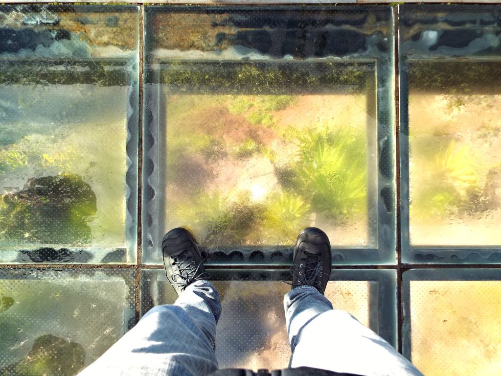Glass floor of the Cabo Girão viewing platform and the view down