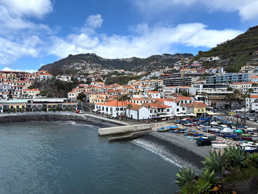 The harbour and buildings of Câmara de Lobos above the bay