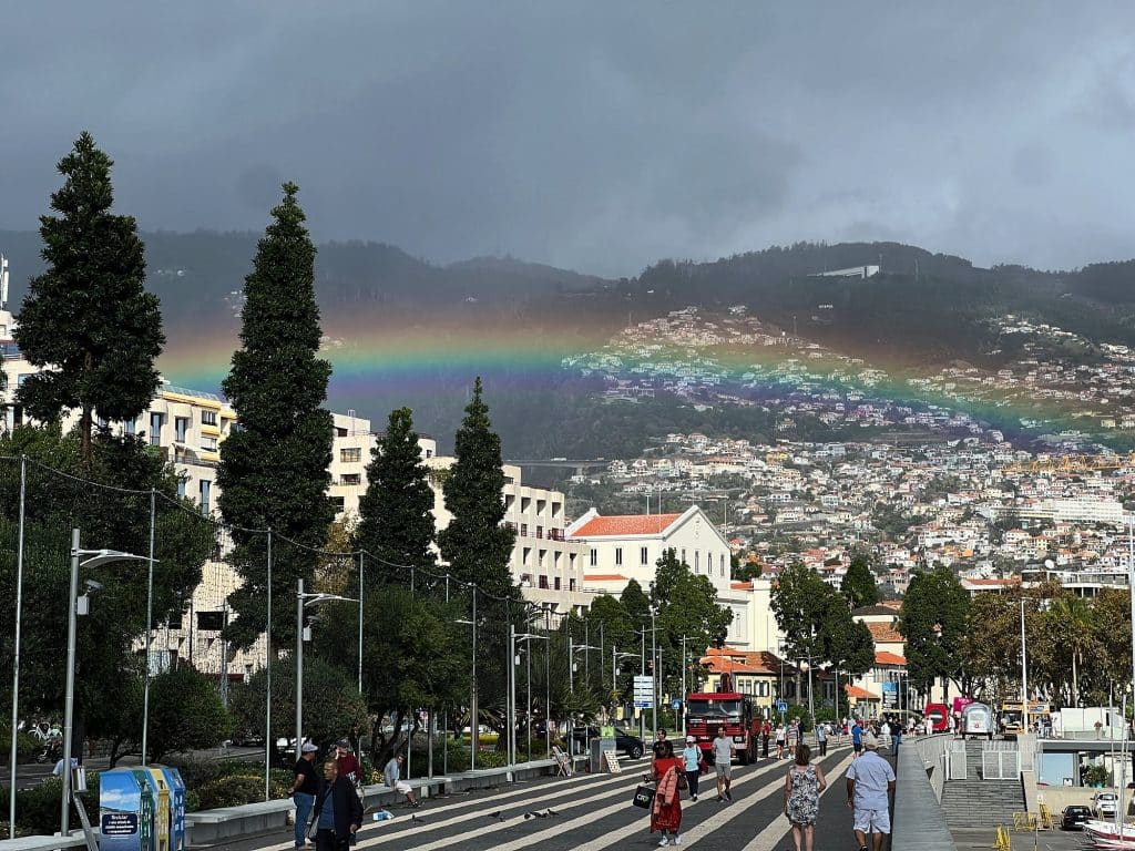 Rainbow over Funchal seen from the promenade by the harbour