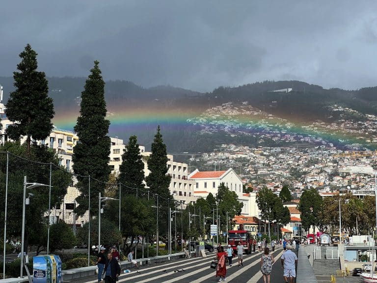 Rainbow over Funchal seen from the promenade by the harbour