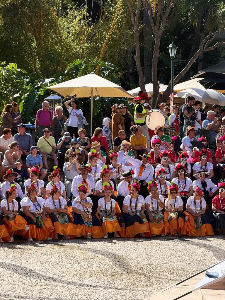 Children in Carnival costumes in the seats of the amphitheatre in the Municipal Garden in Funchal