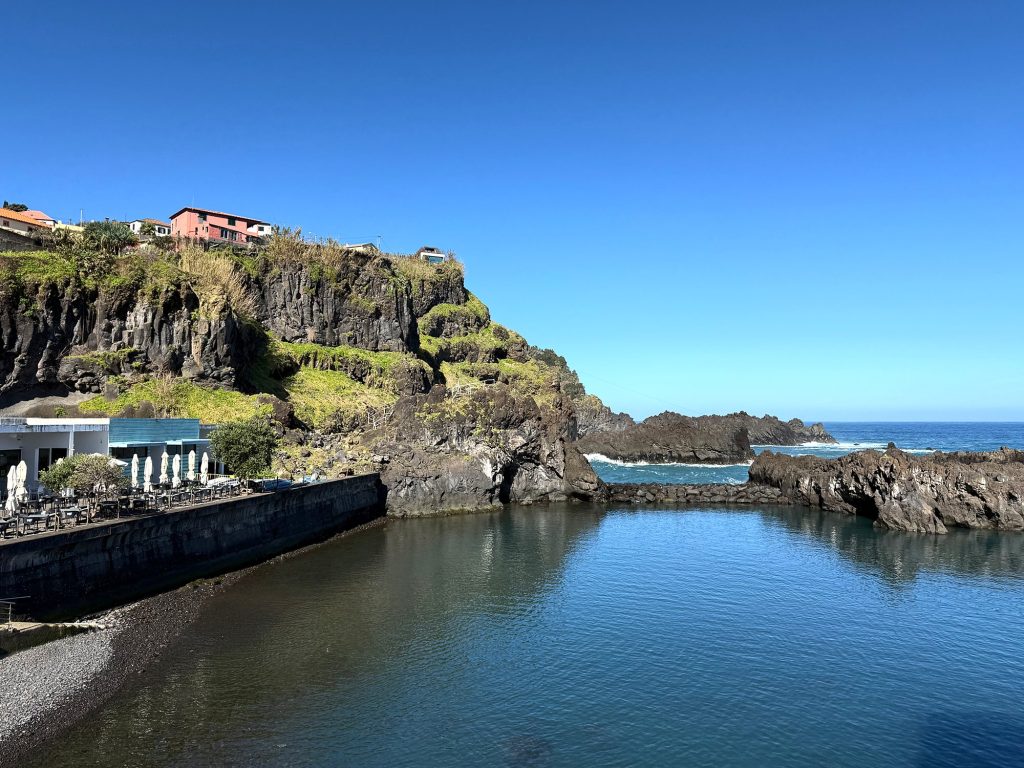 A natural pool below the cliff in Seixal