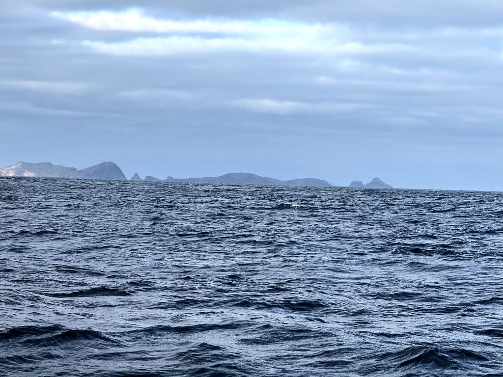 The Desertas islands on the horizon seen from the ocean