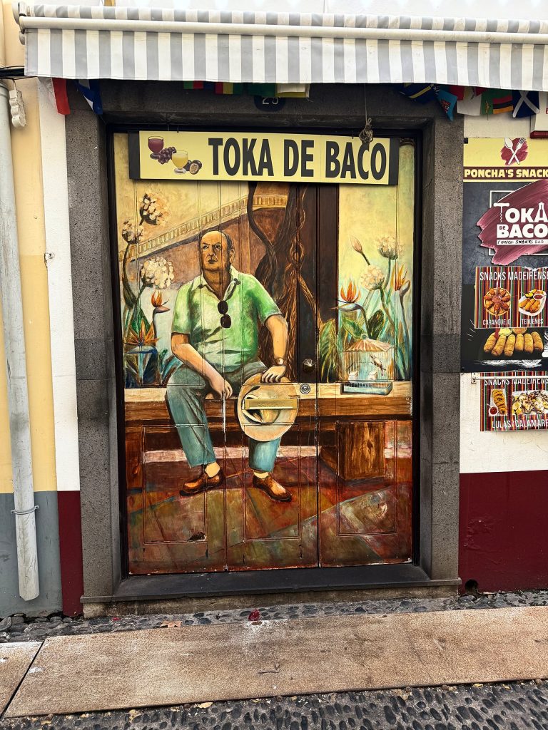 The painted door of the Toka de Baco bar in the Zona Velha, Funchal
